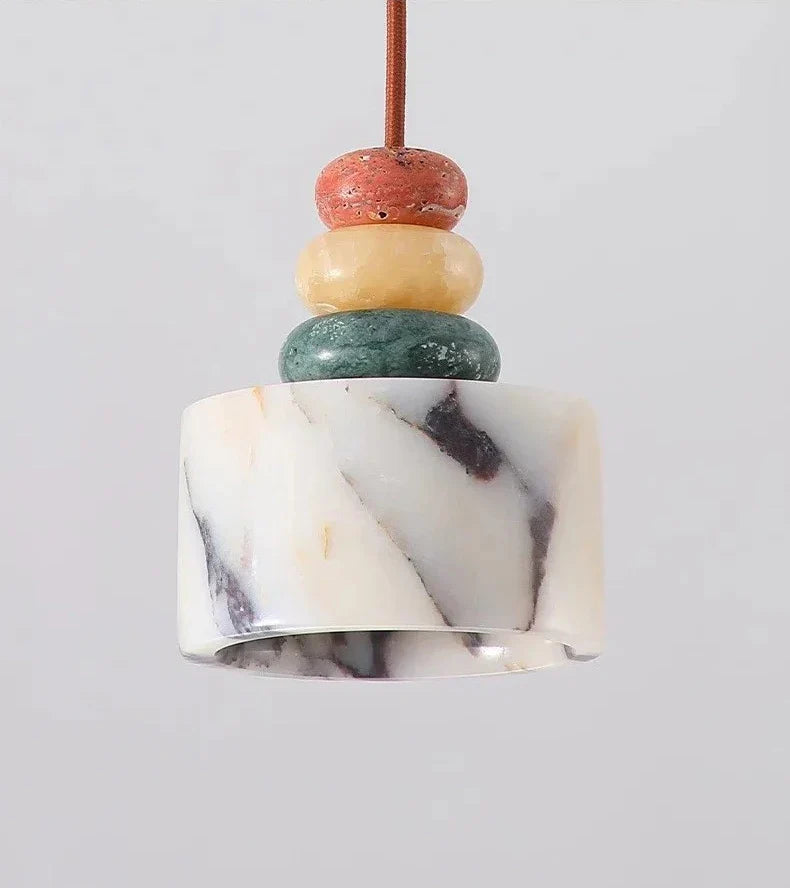 Cairn Pendant Lamp close-up of marble and stone stack