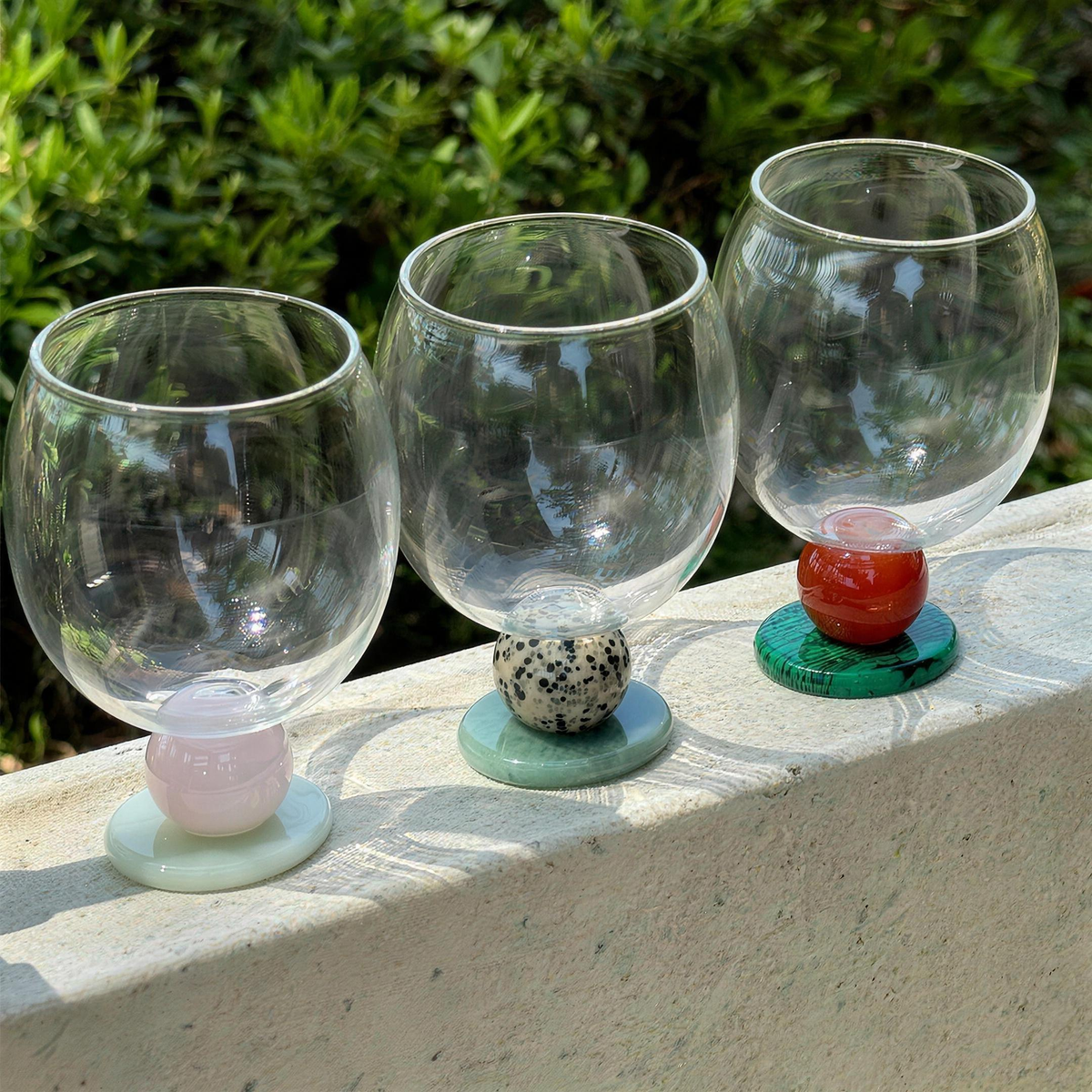 Three Panarea goblets on a garden wall in the sun