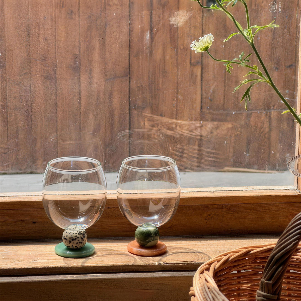 Two Panarea goblets on a wooden window sill