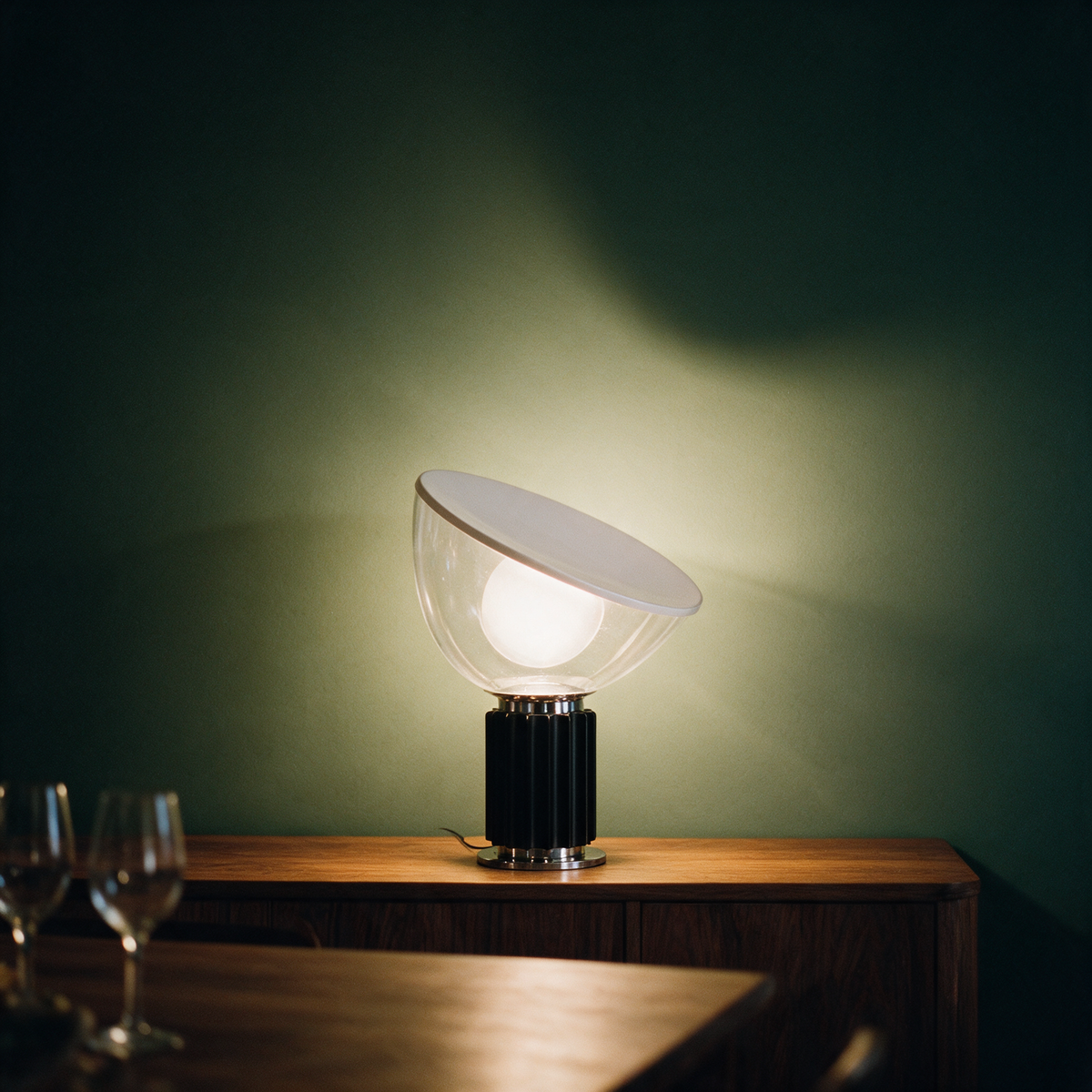 Luca Table Lamp, black, lighting a dark green dining room