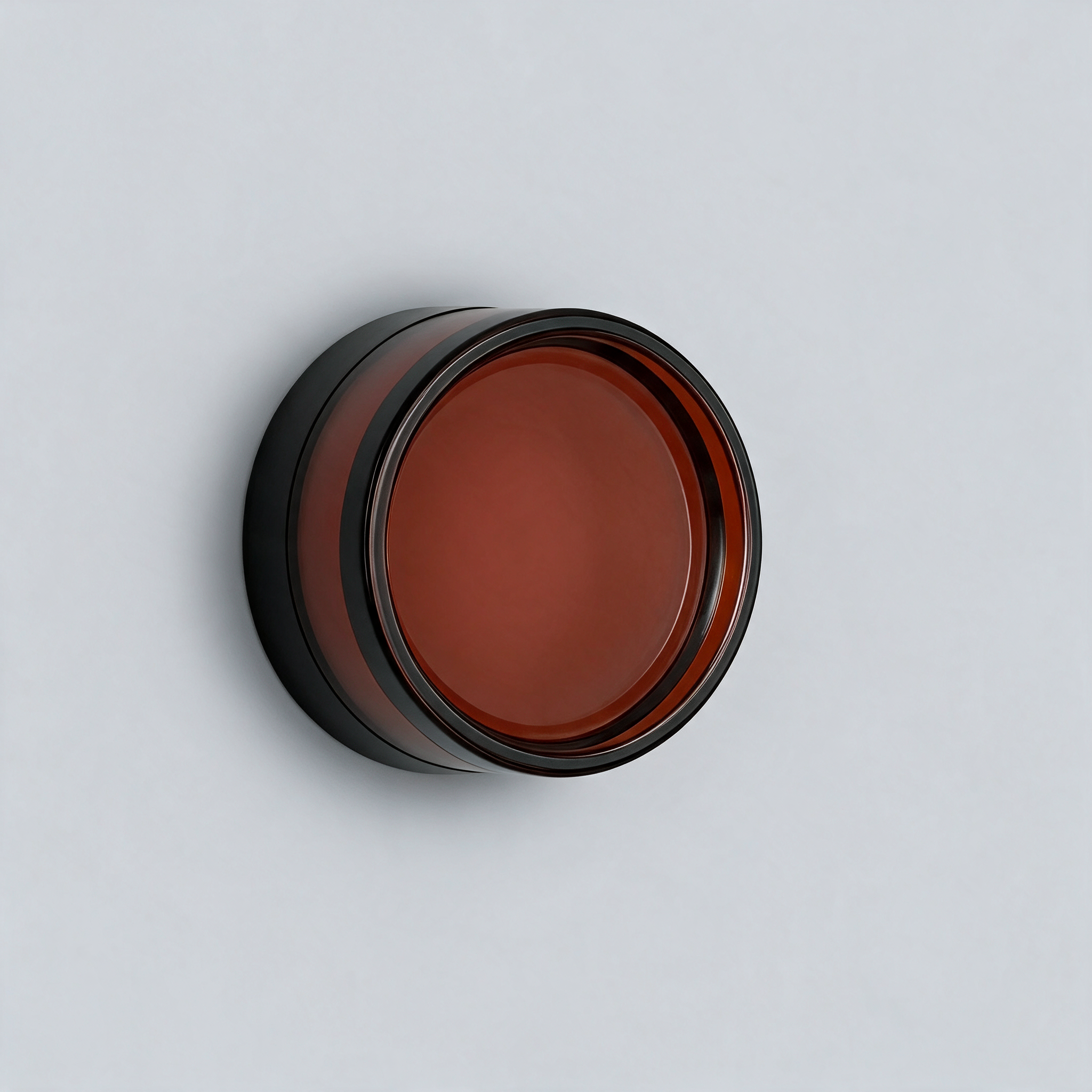 NOOR Wall Sconce, round with amber shade, mounted on a wall