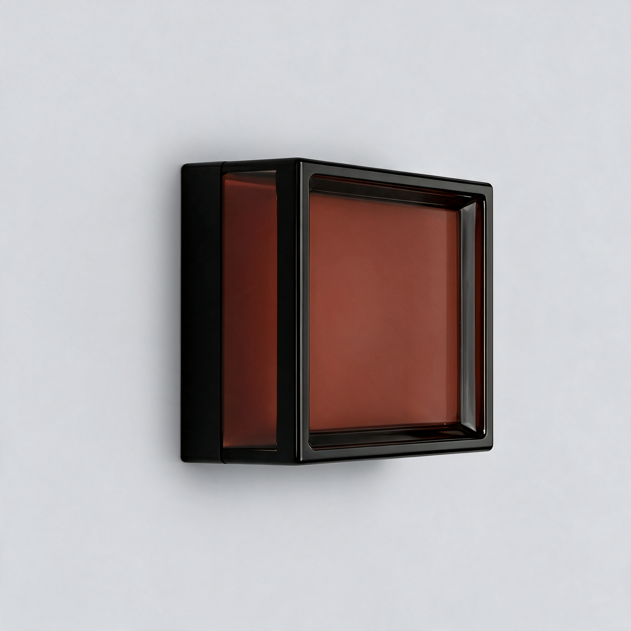 NOOR Wall Sconce, square with amber shade, mounted on a wall