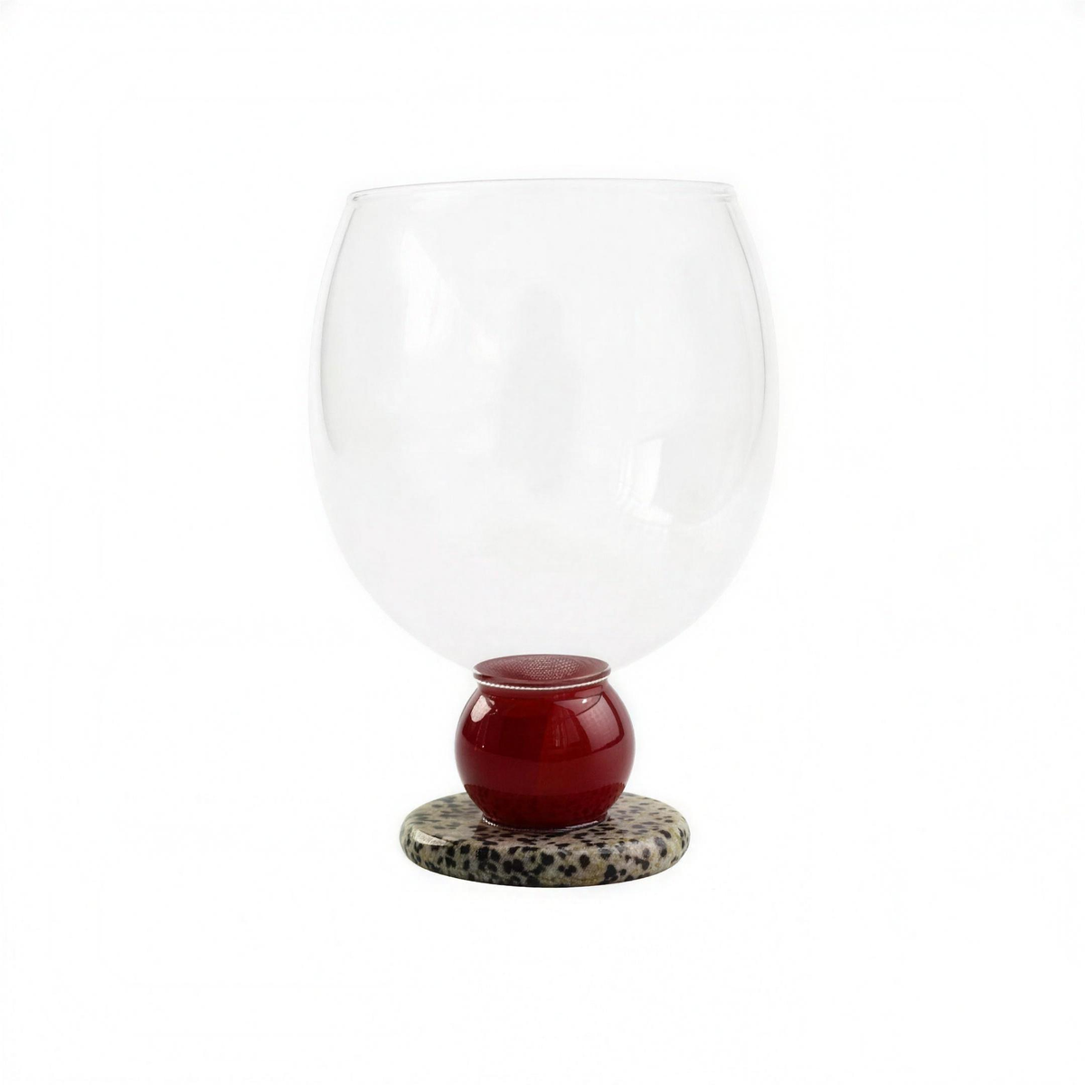 Panarea Glass Goblet in Red & Speckled: red stone ball on a speckled stone foot
