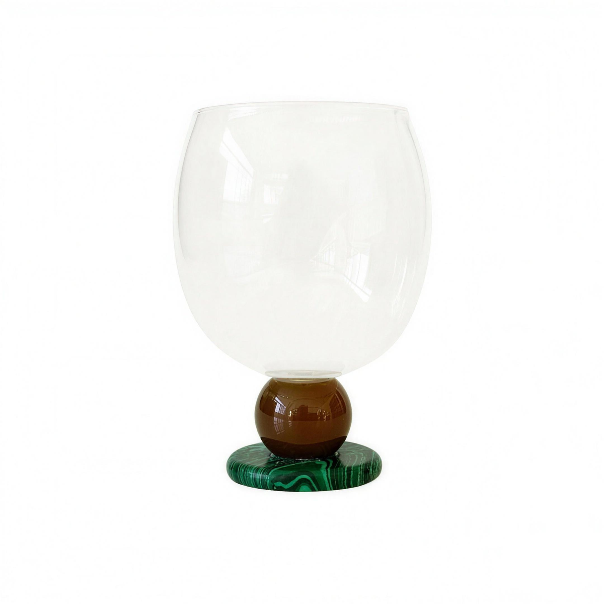 Panarea Glass Goblet in Amber & Green: amber stone ball on a green malachite-pattern foot